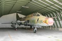 This ex German Su-22 Fitter is stored in a HAS
